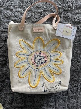 NWT. Brighton Sunny Daisy Tote.  Canvas Tote with Yellow Daisy Stitching.